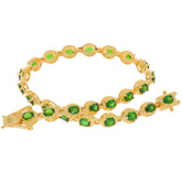 Elegant Oval Green Chrome Diopside and Sterling Silver Bracelet with sparkling accents.